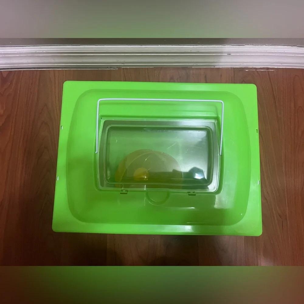 Lime green traveling hamster cage